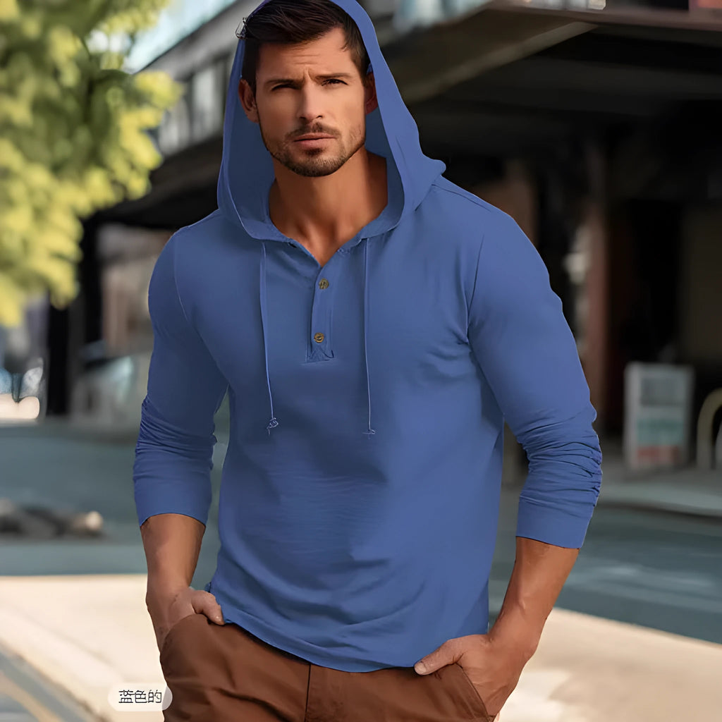 Men's dark blue cotton sports hoodie pullover with long sleeves on a hanger