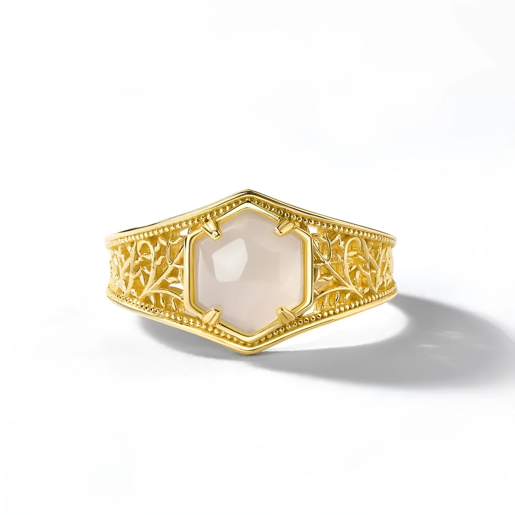 Silver hexagon geometric ring with 10k gold swimming paint finish and adjustable opening for women