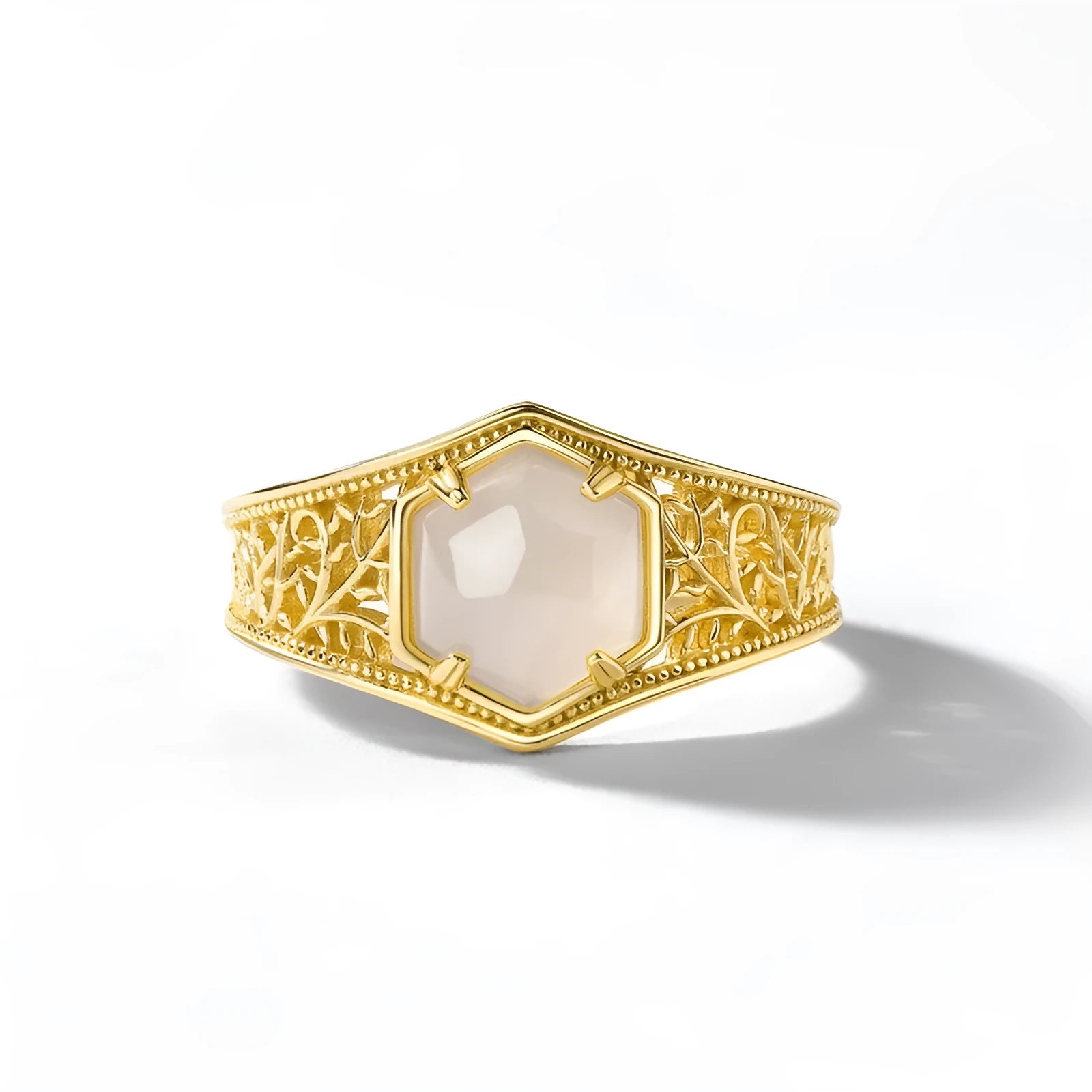 Silver hexagon geometric ring with 10k gold swimming paint finish and adjustable opening for women