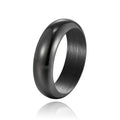 Glossy electroplated titanium steel ring in gold colour on a white background.
