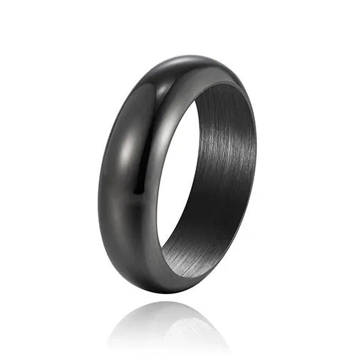Glossy electroplated titanium steel ring in gold colour on a white background.