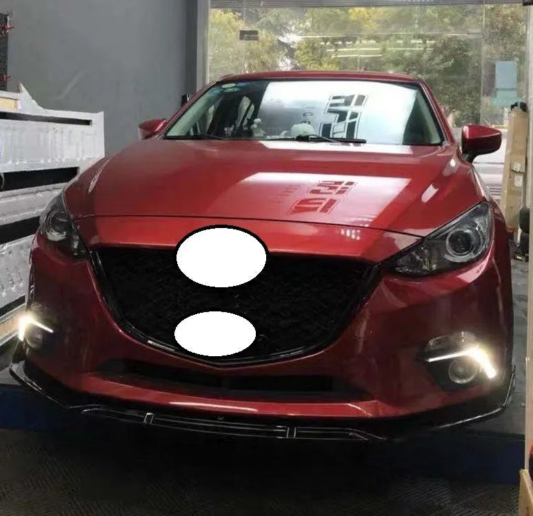 Audi A1 8X front splitter retrofit kit with three-section design in black Unksera pattern.