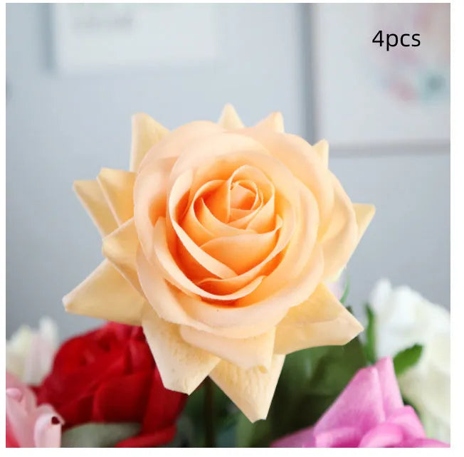 Artificial silk flower bouquet measuring approximately 42cm long with 8.5cm flower heads in multiple colour options