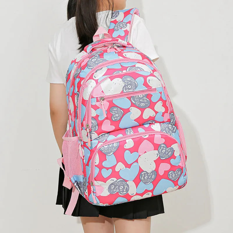 Blue student backpack with air pillow belt system showing shoulder straps and large main compartment