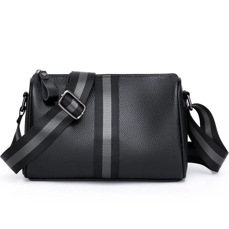 Black genuine leather one-shoulder crossbody bag showing front and strap.