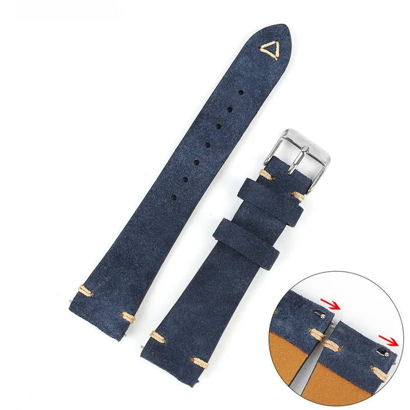 Brown genuine suede leather watch strap showing textured surface and buckle, laid flat.