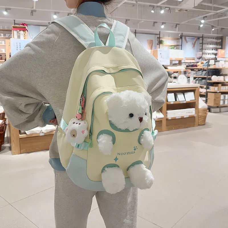 Cute Bear nylon schoolbag with curved shoulder straps, 20-35L capacity, in yellow pink colour