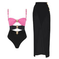 Women's one-piece swimsuit with attached skirt featuring gold button detail in solid colour design