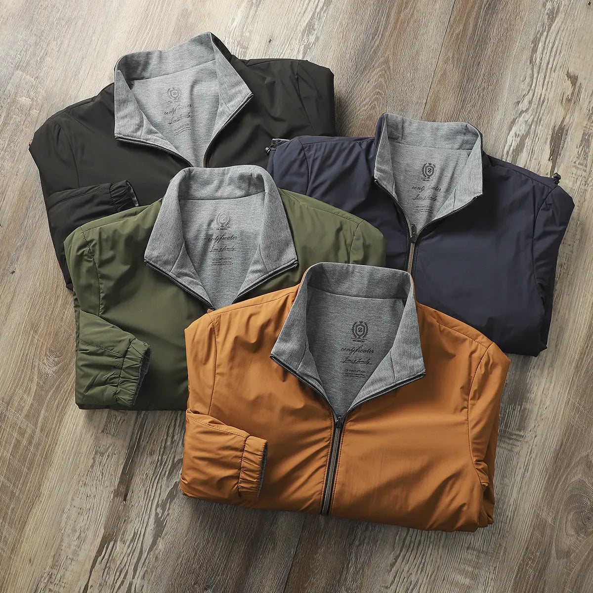 Men's stand collar casual jacket in blue, shown on a model.