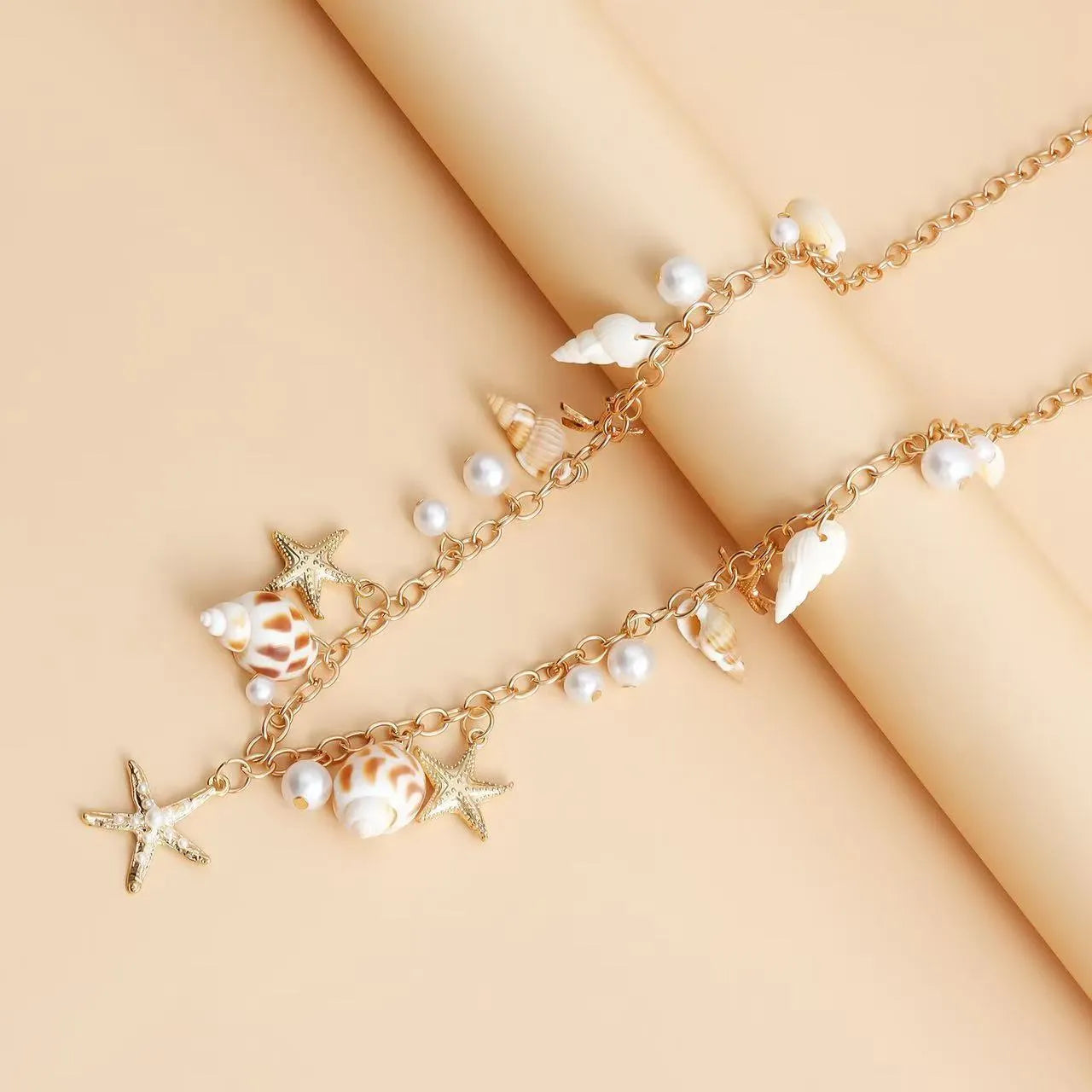 Women's waist chain and bracelet set with star charms in silver tone alloy metal