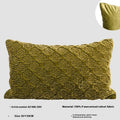 Brown gold antique-style quilted square cushion pillow with three-dimensional texture on a chair.