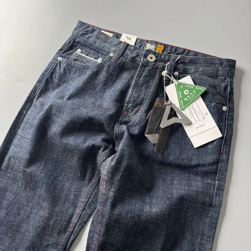 Men's primary colour straight leg denim trousers on a mid-waist fit model, showing American retro style.