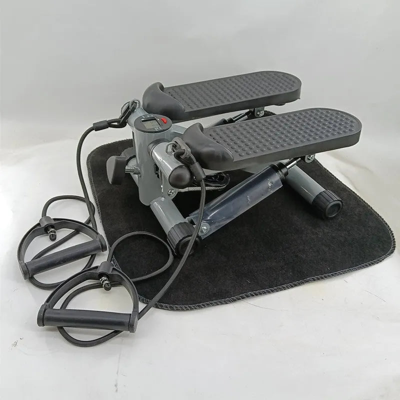 Silver grey household mini treadmill with hydraulic resistance for waist slimming exercises