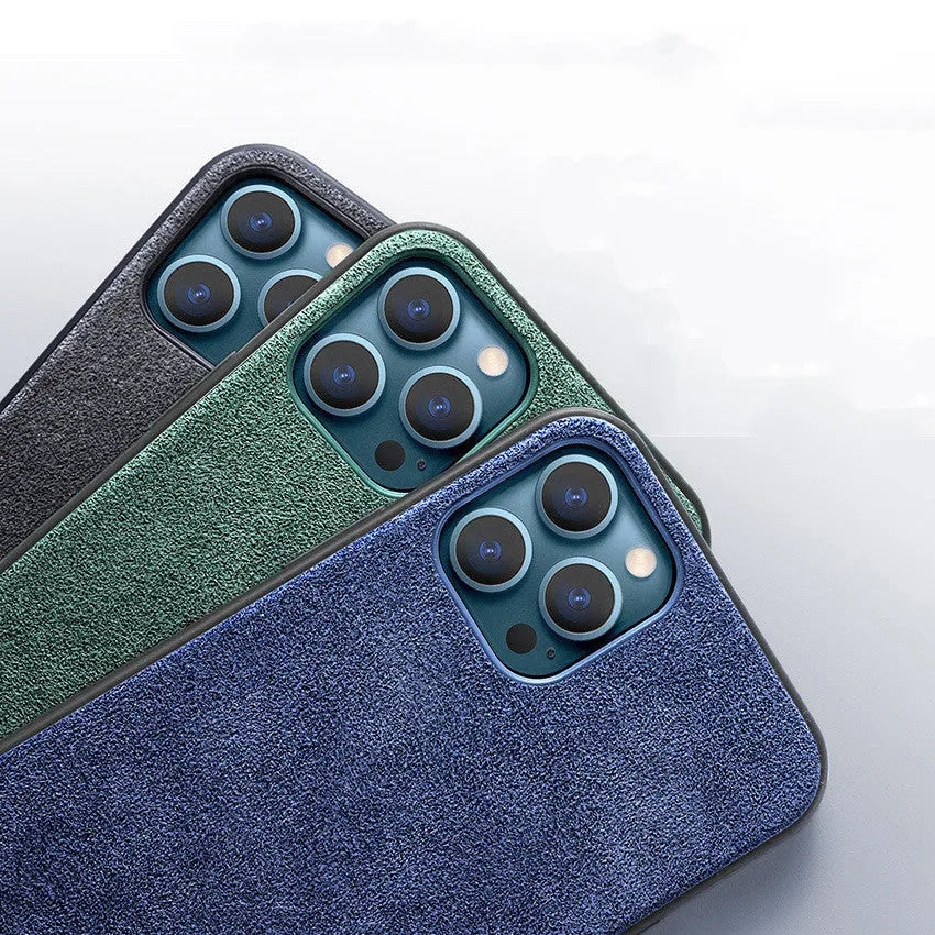 Suede full-cover phone case for iPhone on a dark background, shown in elegant black, dark night green, and dark blue colours.