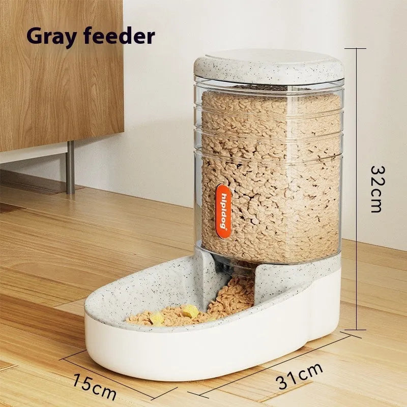 Automatic gravity-fed pet feeder or water fountain with 3.8-litre reservoir in blue, green, grey, or pink colour.