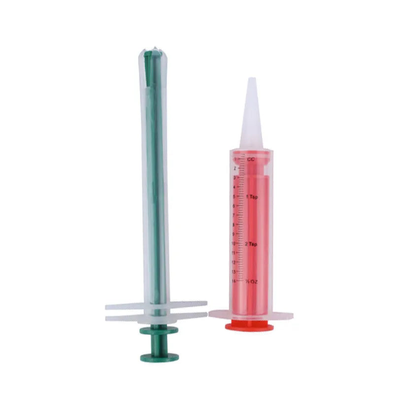 Two silicone-tipped pet pill shooters in different sizes on a white background.