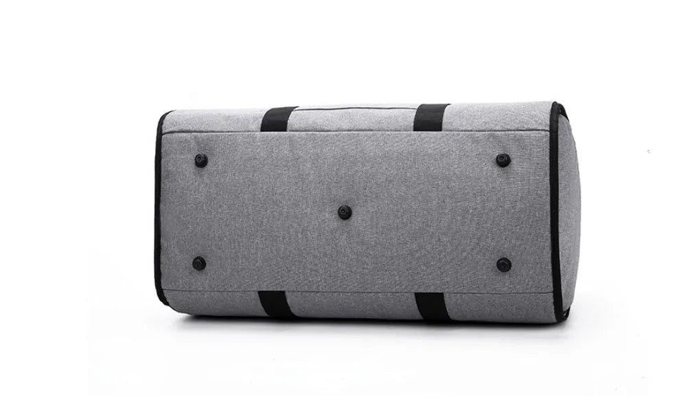Medium cylindrical travel bag in waterproof Oxford cloth available in black, blue, light grey and red