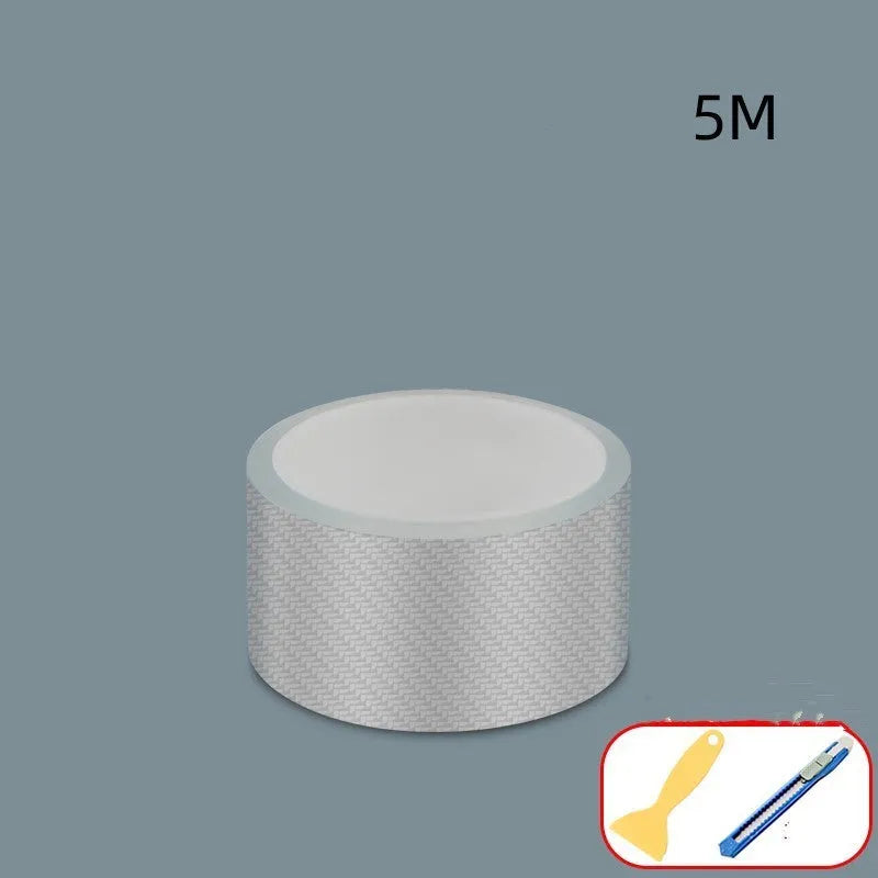 Roll of clear carbon fibre anti-collision film with scraper and utility knife for car door edges