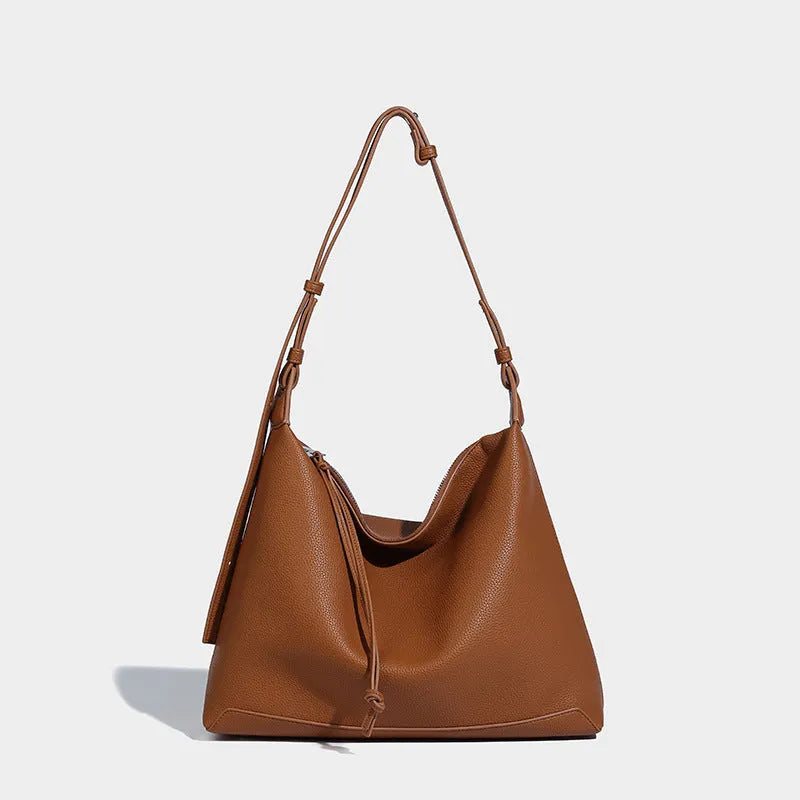 Large capacity underarm shoulder messenger bag in caramel PU leather, 36cm length, with soft texture