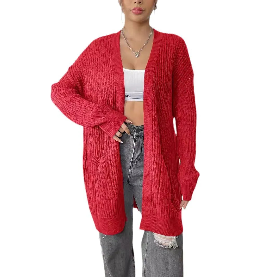 Women's dark green acrylic cardigan with two pockets and long sleeves.