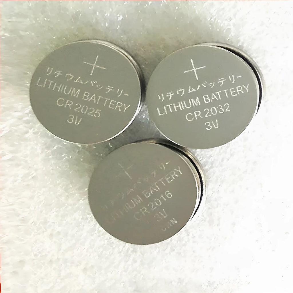 3V button battery CR2032 alkaline cell 20mm diameter on white background