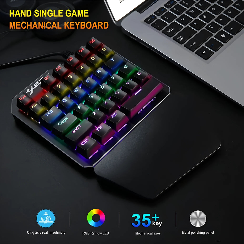 Mini one-handed mechanical gaming keyboard with 35 keys, seven-color backlight, and hand rest on desk