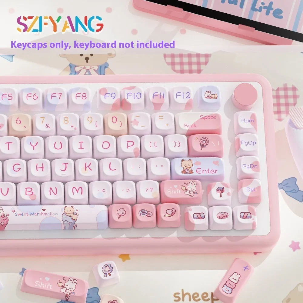 Sweet cotton candy coloured mechanical keyboard keycap set in a box.