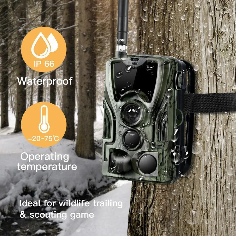 Green cellular trail game camera with belt mount and 2-inch display for hunting
