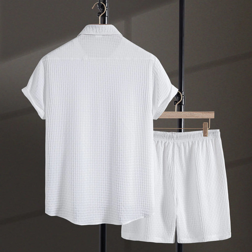 Men's black cotton blend short sleeve shirt and shorts casual summer suit on a hanger.