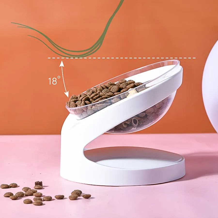 Clear plastic elevated cat food bowl with 15-degree tilt angle on white background