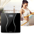 Black electronic household scale with digital display for weight measurement up to 180 kilograms