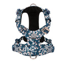 Pure cotton dog chest harness in a floral pattern, showing adjustable straps and sizing options.