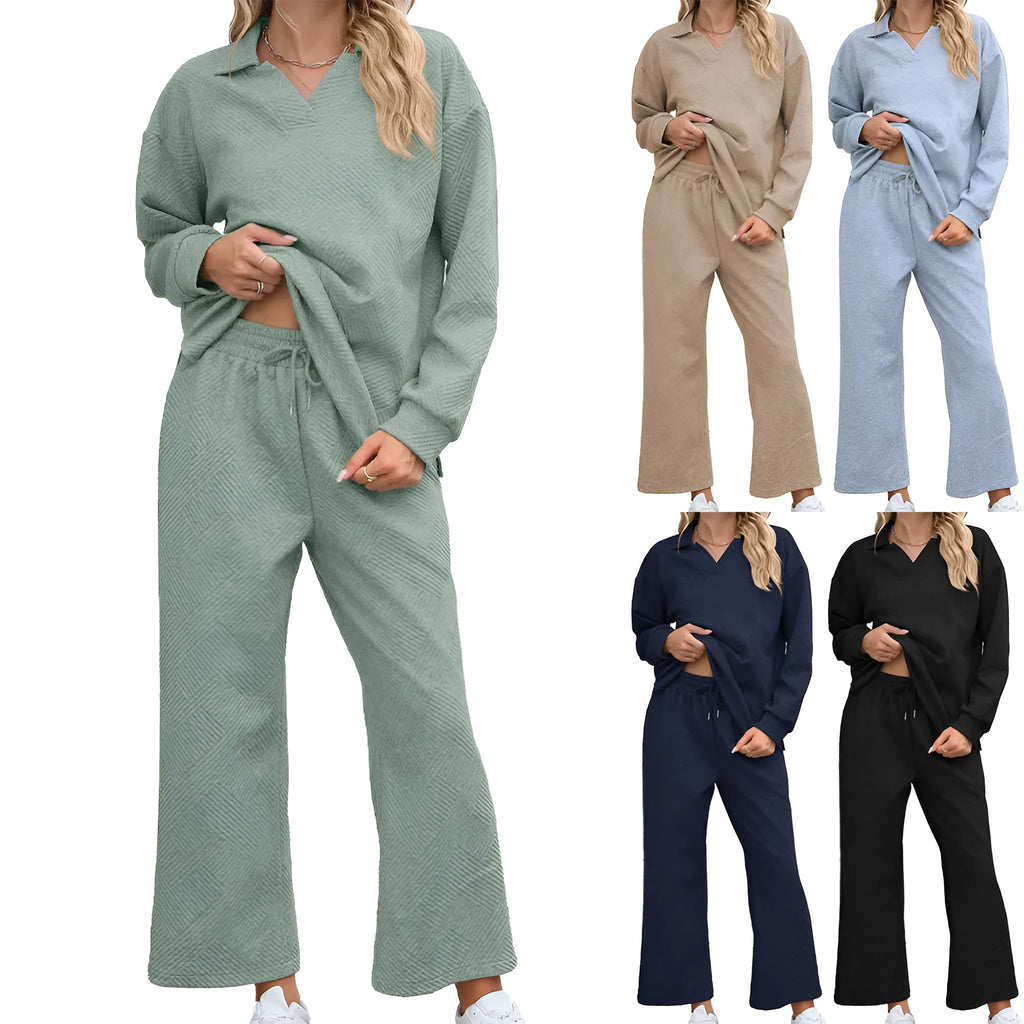 Women's solid colour rayon jacquard knit suit with long sleeve top and elastic waist cropped trousers.