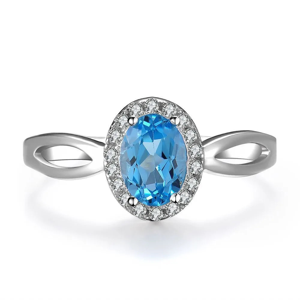 925 sterling silver geometric jewellery set with blue topaz stones including earrings, ring, bracelet and necklace