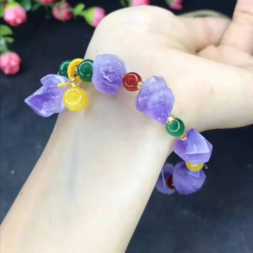 Natural shaped amethyst bead bracelet for women with a fu character charm.