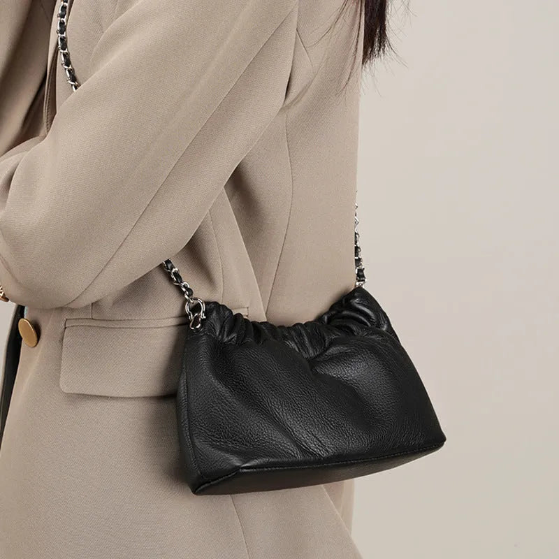 Women's genuine leather chain crossbody bag in soft dumpling shape with phone pocket, beige colour option
