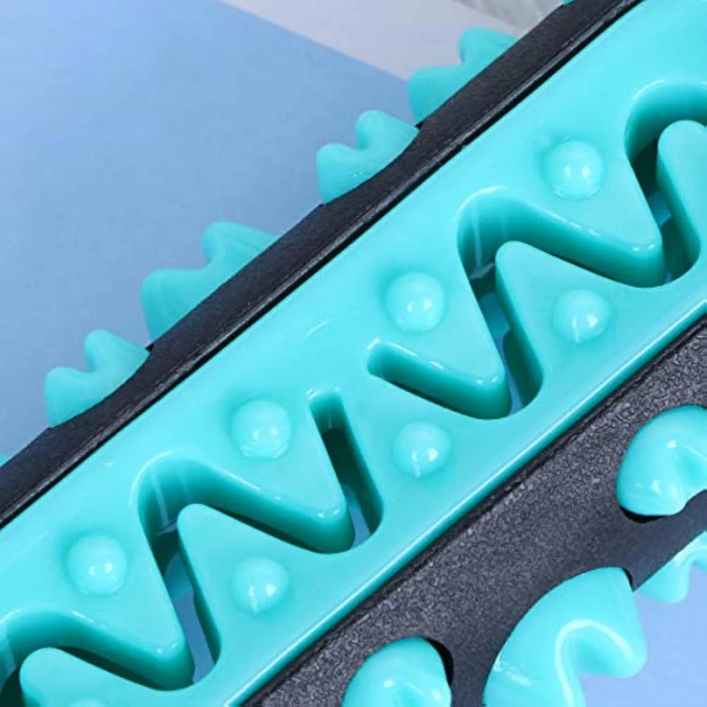Natural rubber dog toothbrush chew toy in blue colour with textured cleaning surface