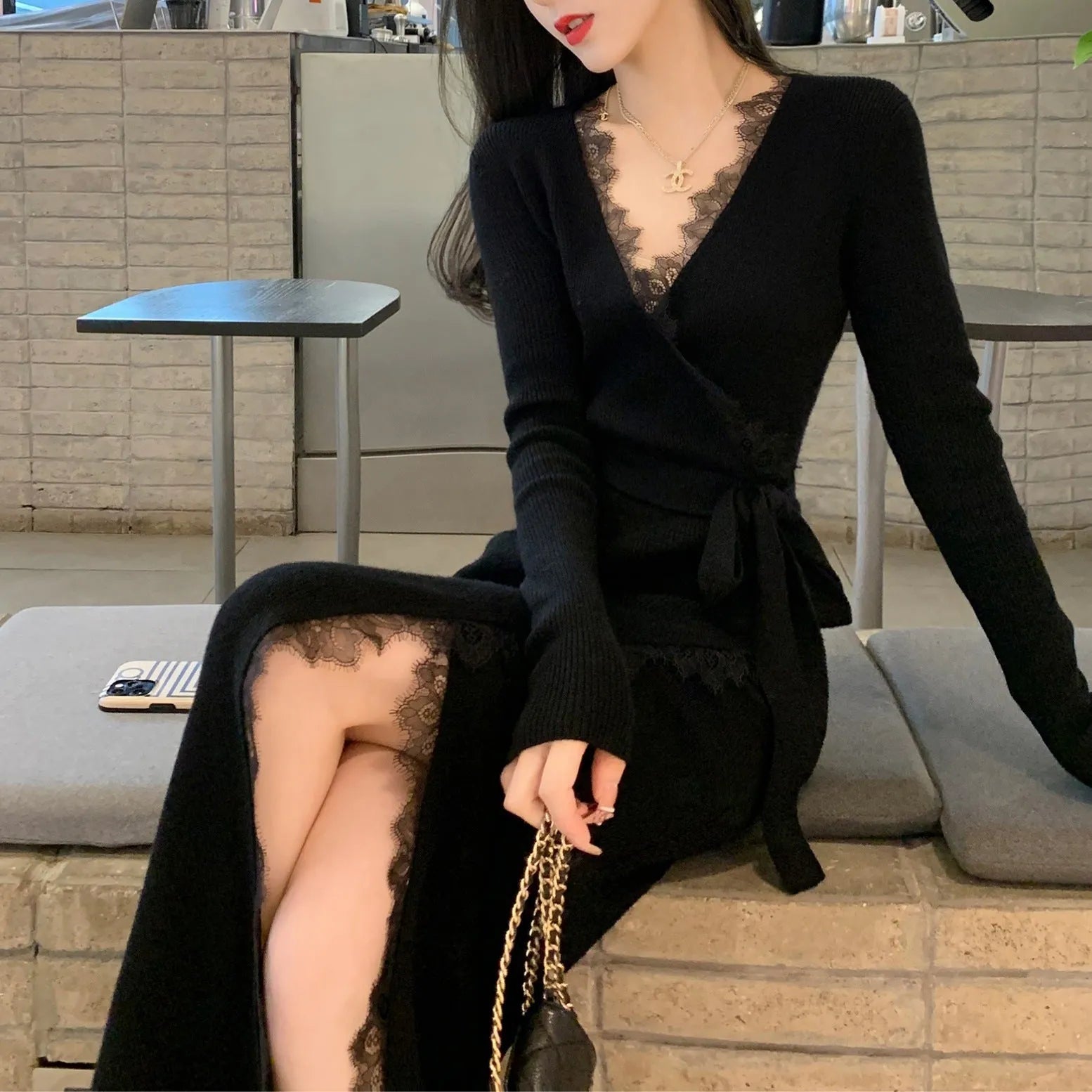 Black women's slim fit princess dress skirt made from polyester, shown on a model.