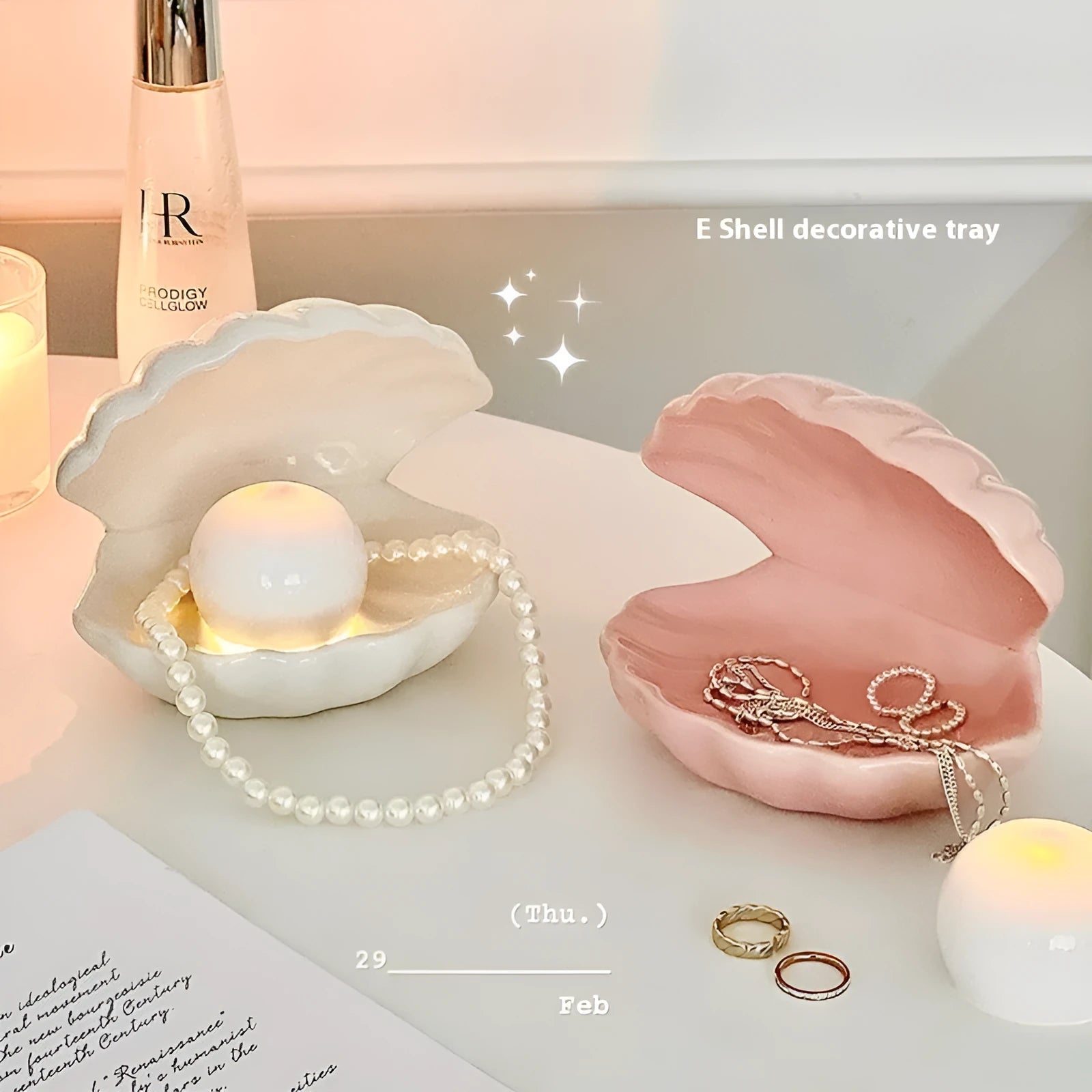 White porcelain girls ornament tray with small night light, shown in yellow and pink shell options.