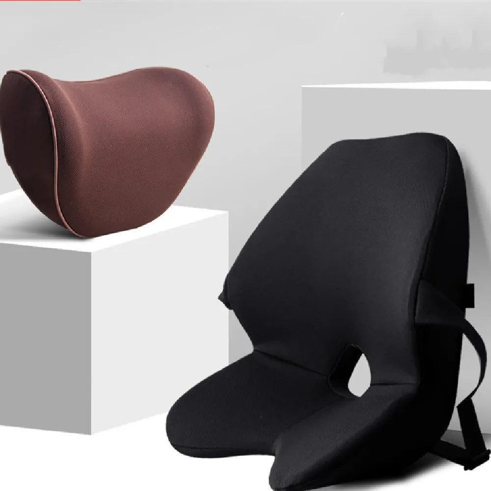 Black memory foam car waist cushion for lumbar support placed on a car seat.
