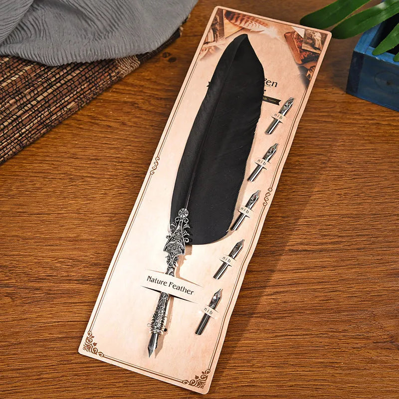 Vintage feather dip pen in ten colours with zinc alloy casing measuring 30×13×4 cm