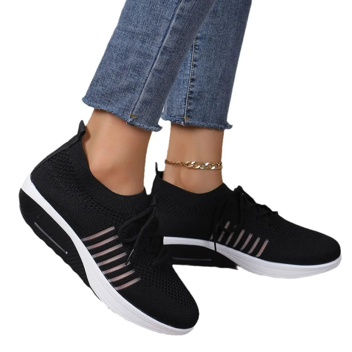 Platform height increasing front lace-up flat shoes for women in black mesh upper and rubber sole with low heel
