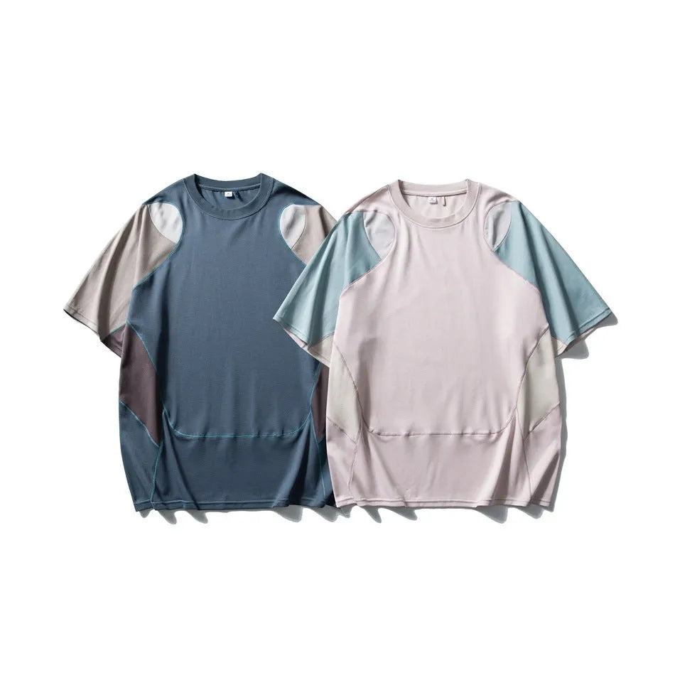 Men's loose blue patchwork contrast sports t-shirt with raglan sleeves on a hanger