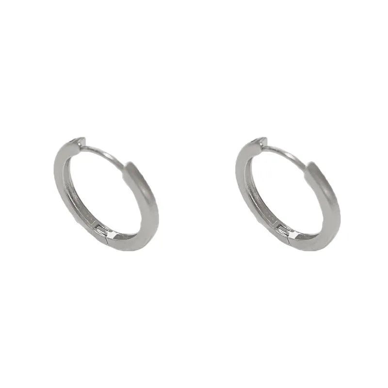 Geometric copper ear clip with real gold plating in simple women's jewellery design