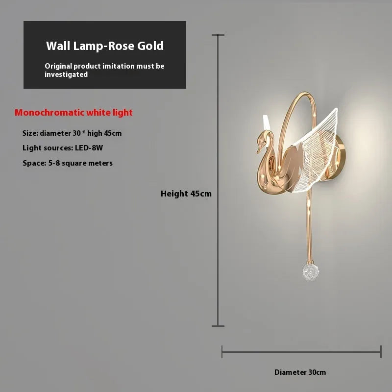 Gold swan-shaped wall lamp with iron construction and acrylic shade