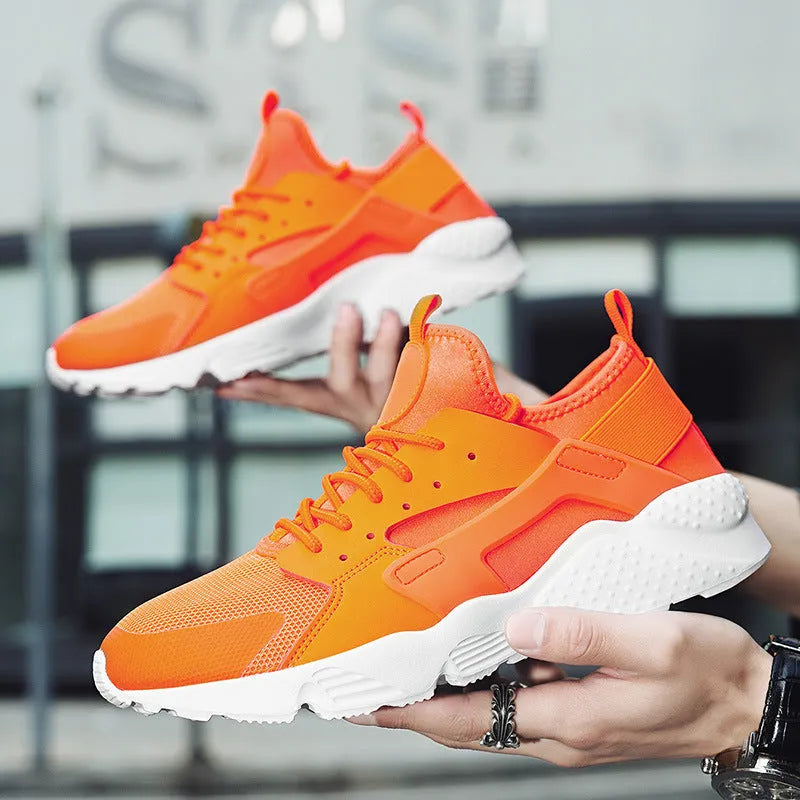 Men's low-top casual sneakers with mesh upper, round toe, and cross shoulder straps in multiple colour options