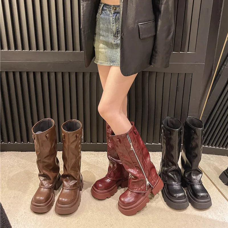 Platform muffin pants Martin boots in black with high cylinder design and rubber sole