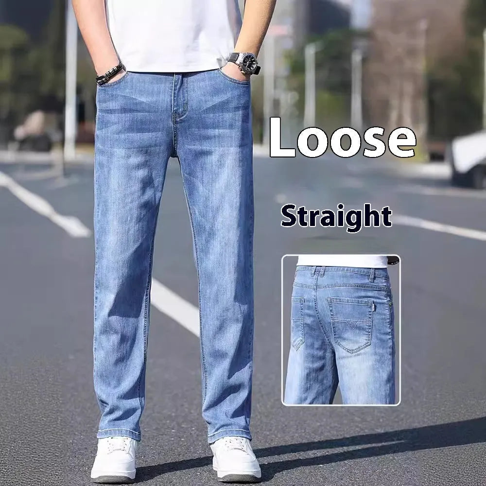 Thin stretch cotton denim trousers in black, tapered business casual style with belt loops and front pockets