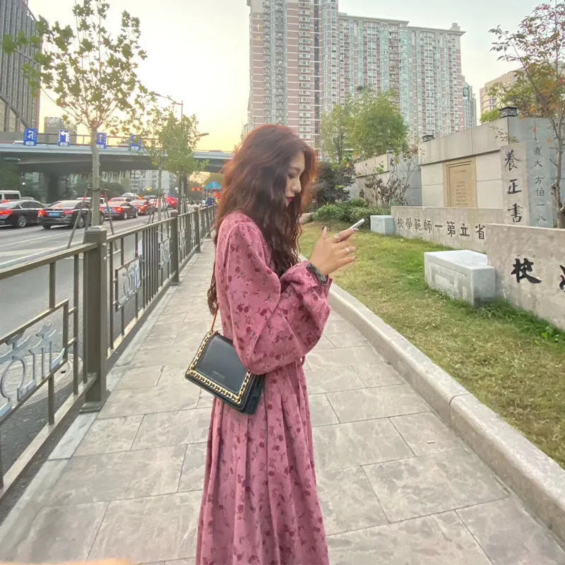 Red floral sweet cover dress with high waist, elastic waist, princess sleeves, and mid-length skirt on a woman
