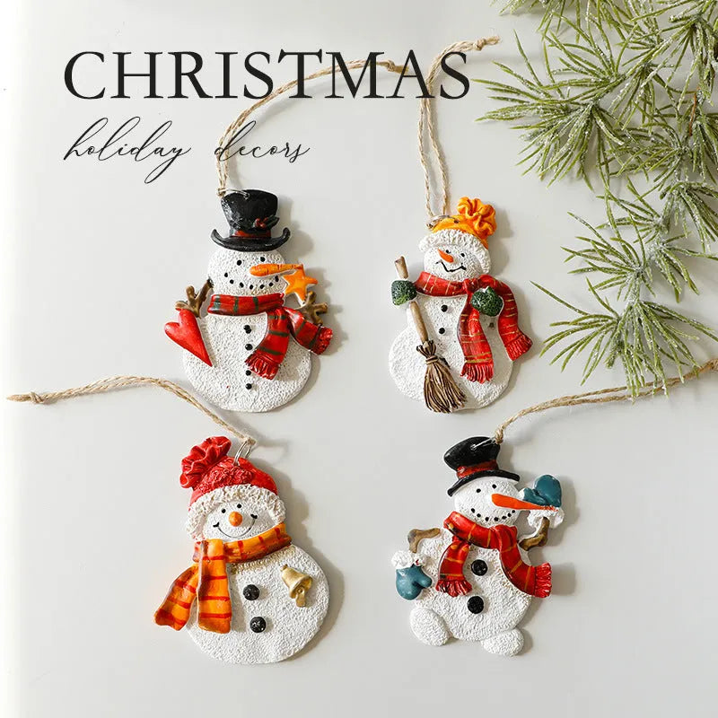 Small resin Christmas tree pendant ornament with a snowman figure holding a broom